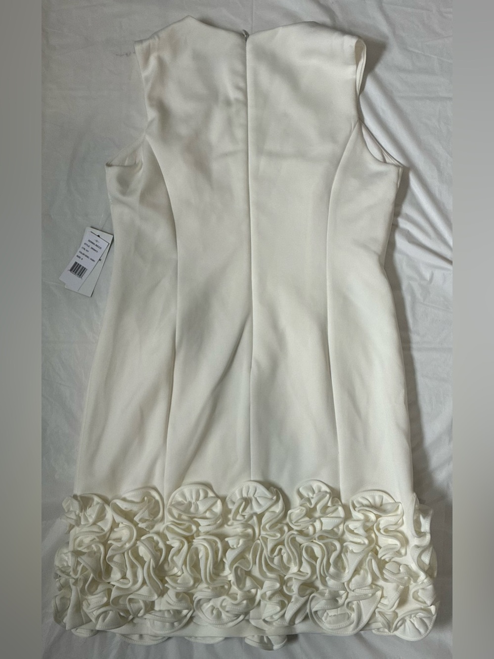 IVORY SLEEVELESS MINI DRESS ROSETTE RUFFLE HEM - Picture 9 of 14